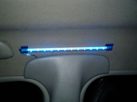 1998 Ford Taurus - Interior view of a car showing a blue LED light bar installed on the headliner.