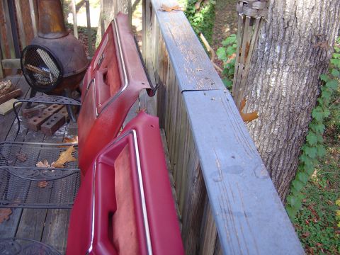 1986 Ford Bronco - The restored drivers side door panel next to the non restored passenger side panel.