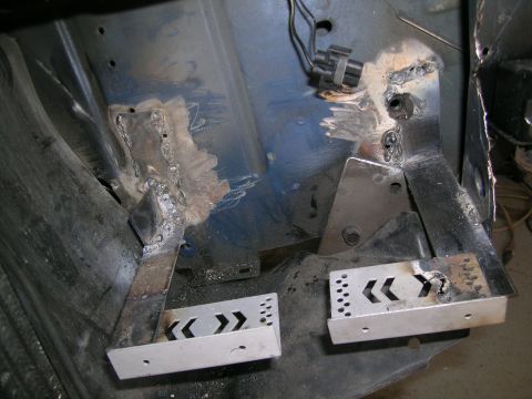 1995 Ford Probe - Custom fabricated pedal assembly with chevron cutouts, welded into a vehicle's interior.