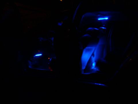 1998 Ford Taurus - Blue LED accent lights installed in a car's interior.