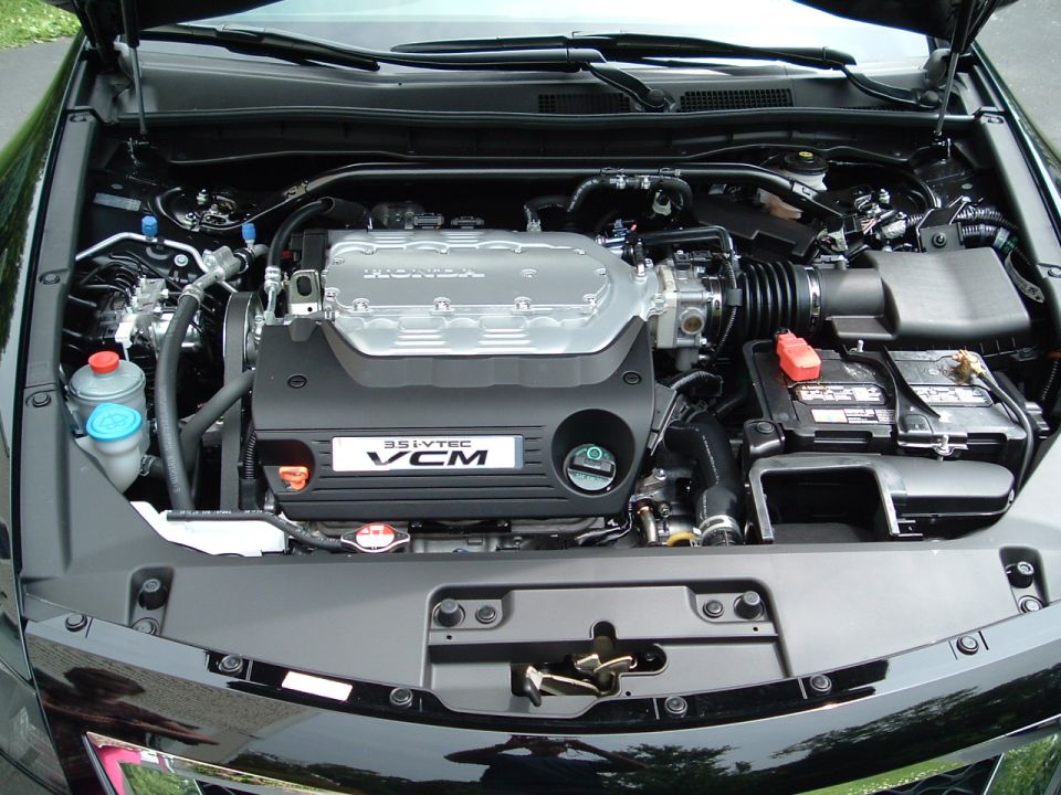 2010 Honda Accord engine bay with VCM badge