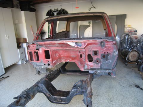 1986 Ford Bronco - This stripped-down Ford Bronco body shell is ready for restoration or parts.