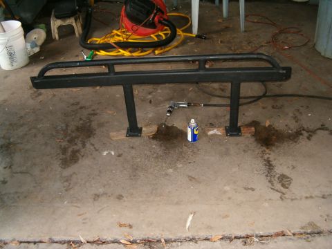 1991 Ford Bronco - Me drilling out the holes it 1/2 inch. 5 of the 1/2 inch bits later and I am done.