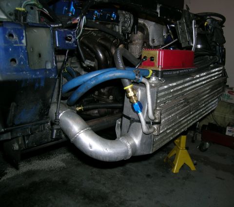 1995 Ford Probe - Custom turbo intercooler piping and engine components are visible in this close-up shot.