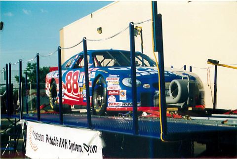 1971 Ford Ranchero - A race car is positioned on a dynamometer for testing.