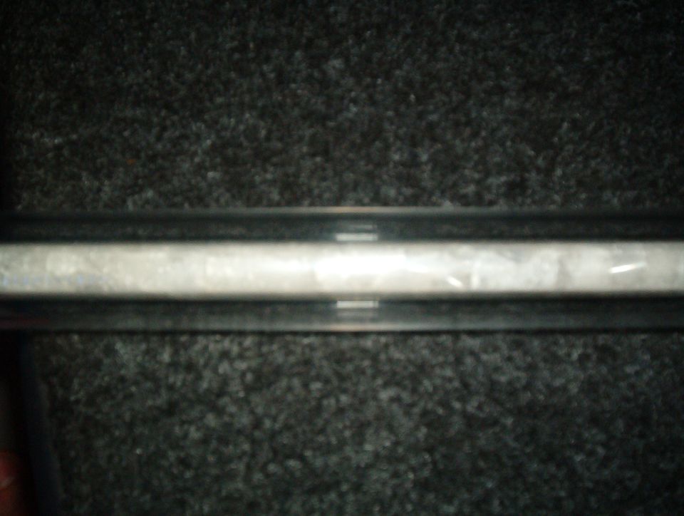 Interior trim piece with textured surface
