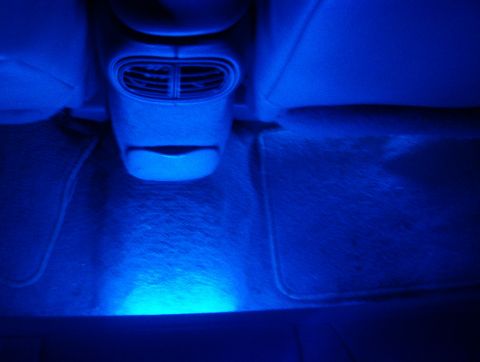 1998 Ford Taurus - Blue LED footwell lighting installed in the rear interior of a 1998 Ford Taurus.