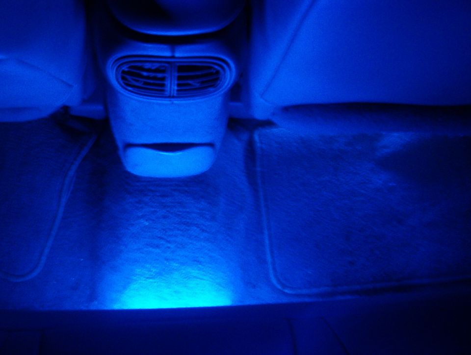 1998 Ford Taurus interior with blue footwell lighting