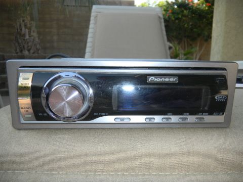 1997 Ford Ranger - This Pioneer car stereo features a prominent volume knob and a digital display for audio information.