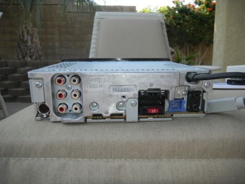 1997 Ford Ranger - Car stereo rear panel with RCA inputs, fuse holder, and wiring connectors visible.