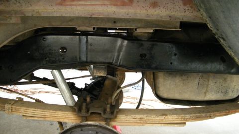 1982 Ford Bronco - Close-up view of the rear axle and suspension components of a vehicle, likely from the 1980s.