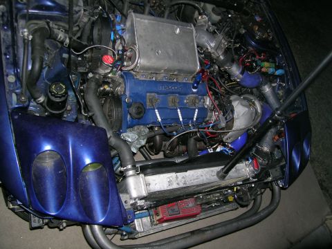 1995 Ford Probe - Customized Mazda engine a turbo intercooler and aftermarket exhaust components.