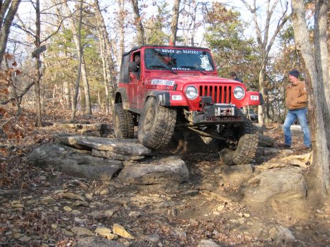 2005 Jeep Wrangler - Red 2005 Jeep Wrangler tackles a challenging rocky off-road course.