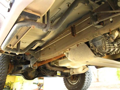 1996 Ford Bronco - Underbody view of a 1996 Ford Bronco, detailing the frame and drivetrain components.