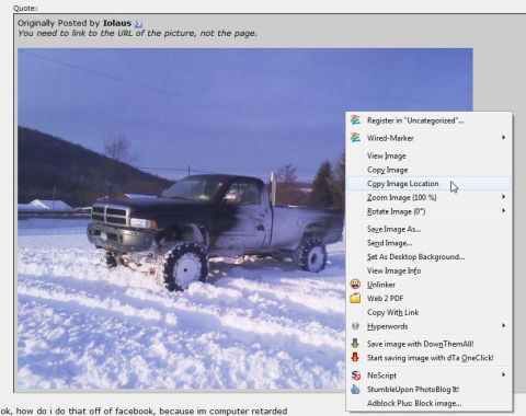 1990 Ford Bronco - A pickup truck is stuck in the snow with its tires partially submerged.