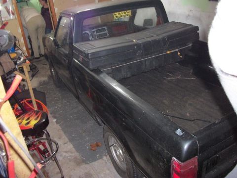 1987 Ford Ranger - This 1987 Ford Ranger pickup truck is parked inside a garage.