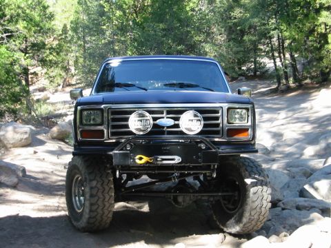 1985 Ford Bronco - This modified Ford Bronco is equipped for off-road adventures with its lifted suspension and heavy-duty bumper.