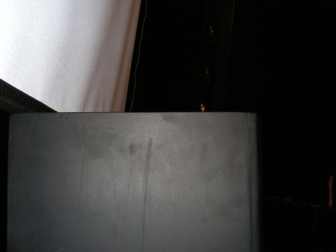 1987 Ford Bronco - Interior panel detail, possibly from a vehicle, with a dark background.