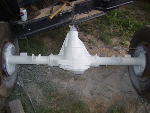 1992 Ford F-150 - Rear axle assembly, likely from a truck, painted white and ready for installation.