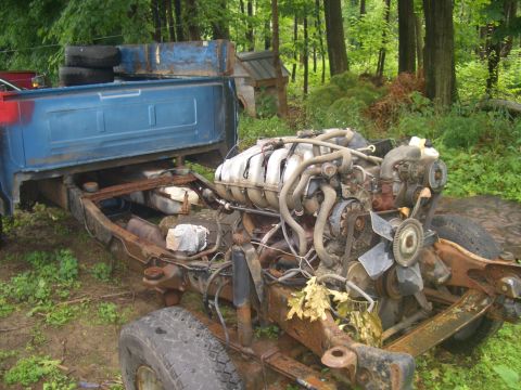 1992 Ford F-150 - The engine is the primary focus of this image, with the truck's chassis and bed visible.