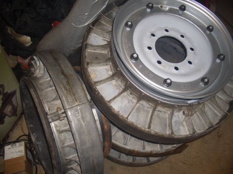 1992 Ford F-150 - A collection of heavy-duty truck wheels, some showing significant wear and tear.
