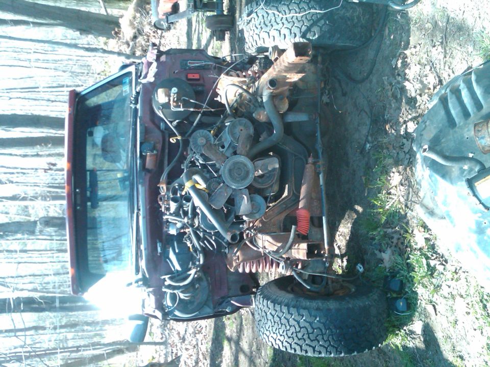 1992 Ford F-150 engine bay, maroon truck