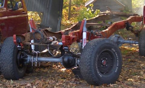 1996 Ford Bronco - The frame and suspension of a 1996 Ford Bronco are shown in this outdoor photo.