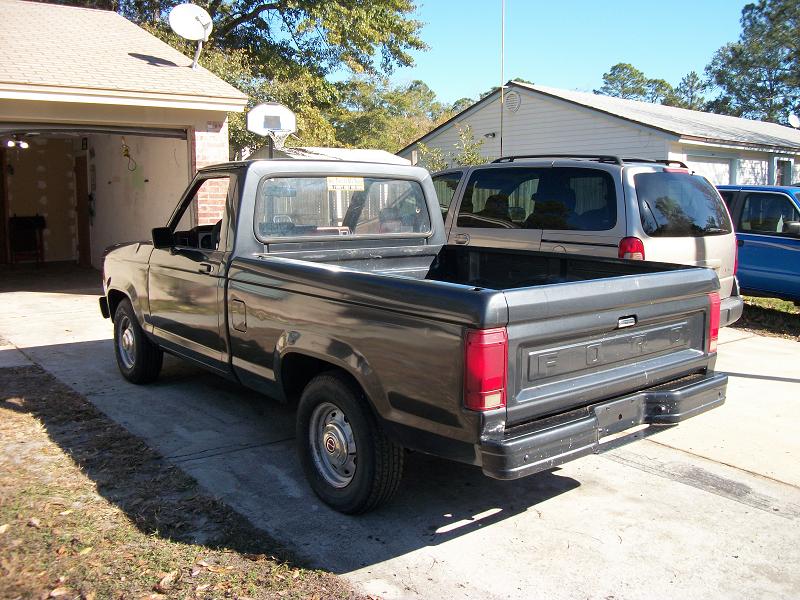 1987 Ford Ranger pickup truck rear view, dark gray
