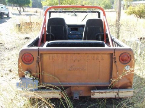 1961 International Scout 800 - The tailgate reads 'INTERNATIONAL Scout'. The vehicle appears to be a Scout 80 or 800, not a 1961 model.