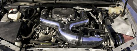 2006 Cadillac STS - Engine bay of a 2006 Cadillac STS showing a custom intake system.
