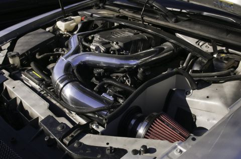2006 Cadillac STS - Close-up of an engine bay an aftermarket cold air intake system.