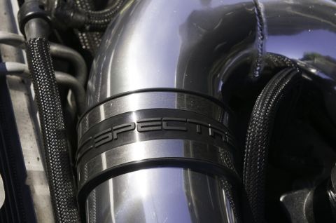 2006 Cadillac STS - Close-up of a Spectre branded engine intake tube, part of an engine component.