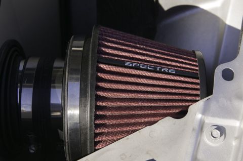 2006 Cadillac STS - Close-up of a Spectre brand air filter assembly, likely for an engine intake system.