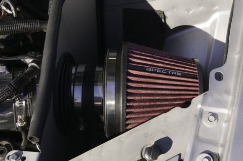 2006 Cadillac STS - Close-up of a Spectre performance air filter installed in an engine bay.