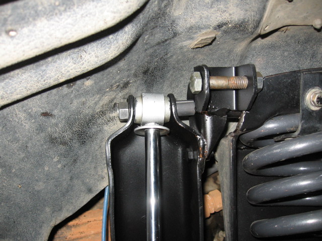 Undercarriage suspension shock, sway bar link, bracket and coil spring