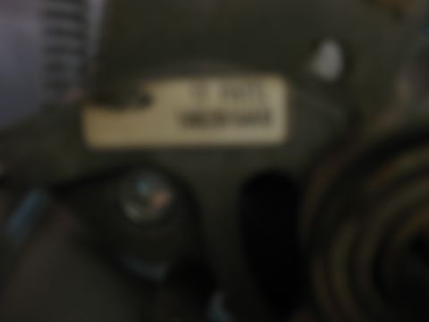 1995 Ford Bronco - A label is visible on a dark component within a vehicle's interior.