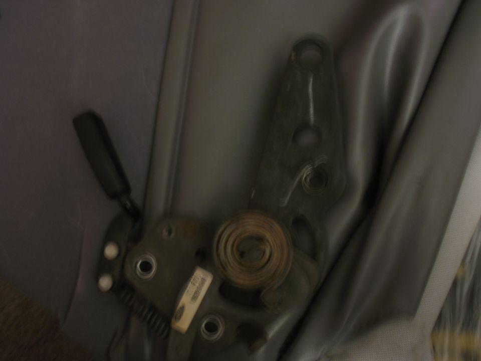 Seat adjustment mechanism with lever and spring, gray upholstery