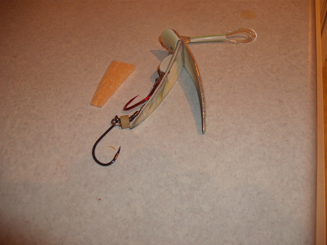 Fishing lure with hooks and a piece of foam