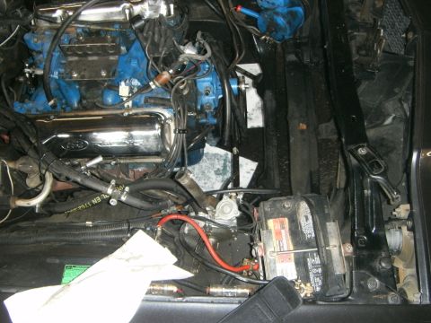 1972 Ford Ranchero - Close-up view of an engine bay, a blue engine block and chrome valve covers.