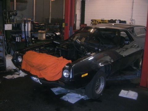 1972 Ford Ranchero - 1972 Ford Ranchero undergoing service in a workshop.