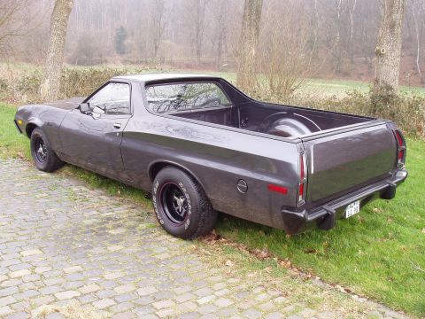 1972 Ford Ranchero - Rear view of a 1972 Ford Ranchero pickup truck parked outdoors on a paved surface.