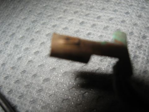 1994 Ford Bronco - A close-up view of a single electrical connector, likely a part from a vehicle or other machinery.