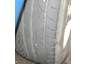 1993 Mazda MX-3 - Tire tread detail with some sidewall text visible.