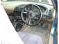 1993 Mazda MX-3 - Interior view of a car's dashboard and steering wheel.