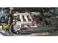 1993 Mazda MX-3 - Close-up view of an engine compartment, showing various mechanical components.