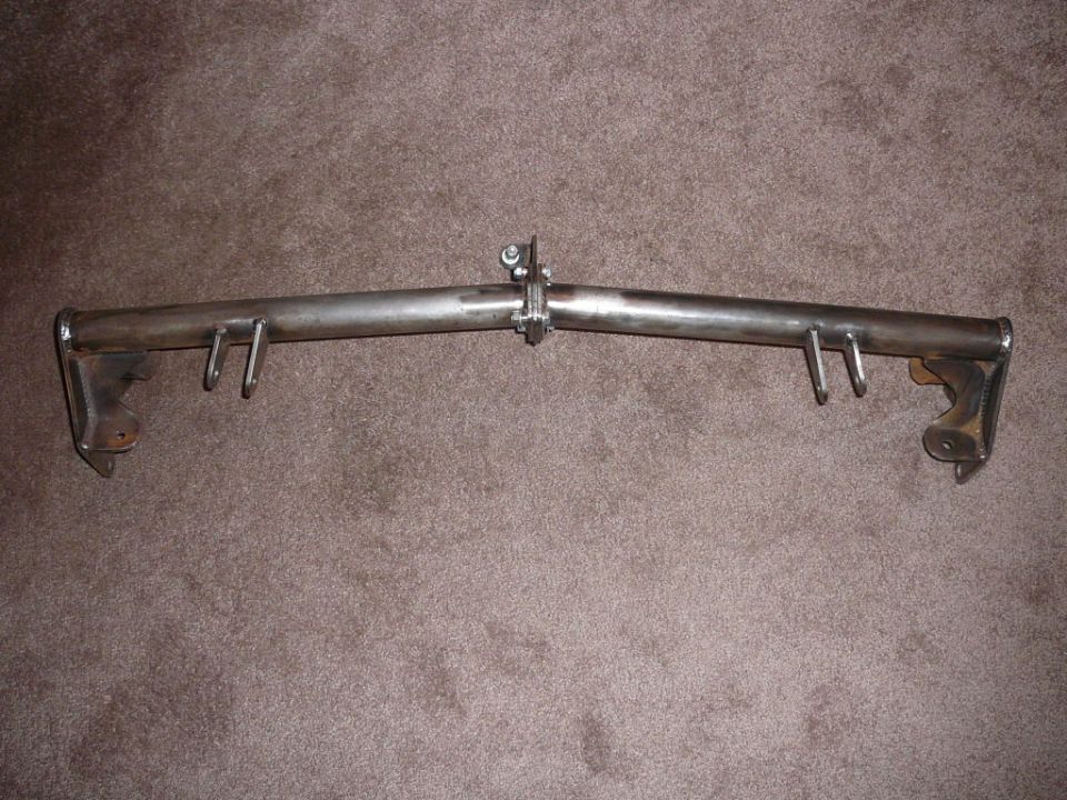 Metal bar with hooks and mounting brackets