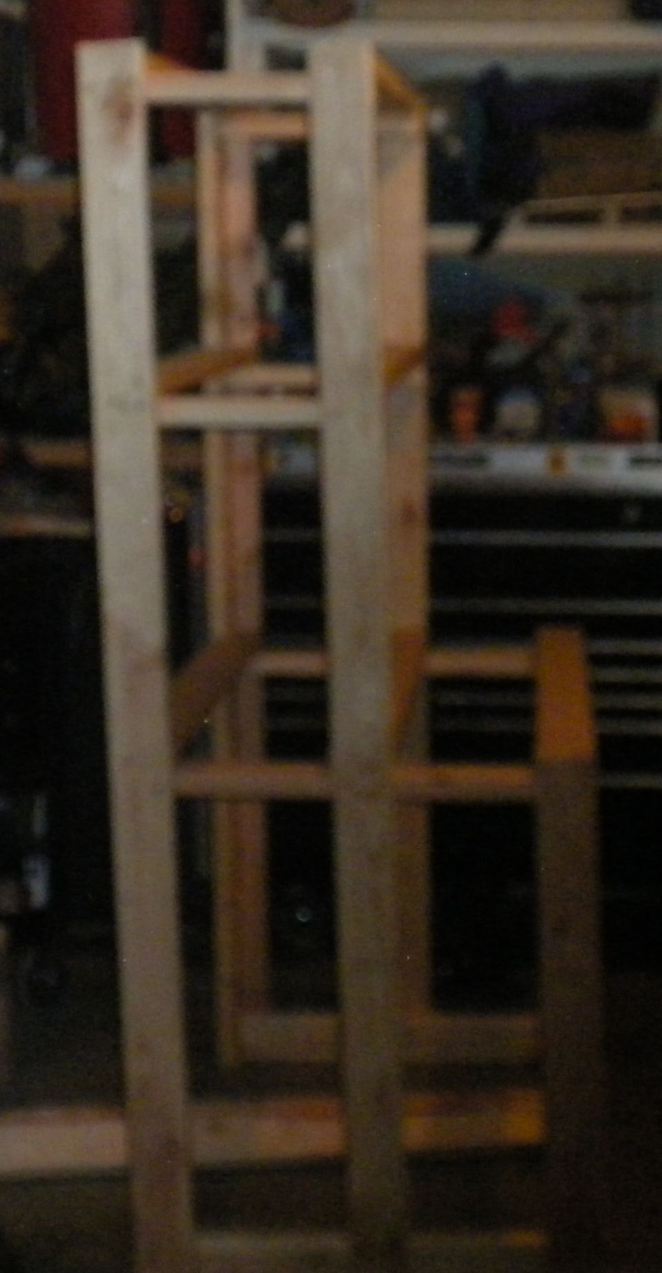 wooden shelving unit in garage