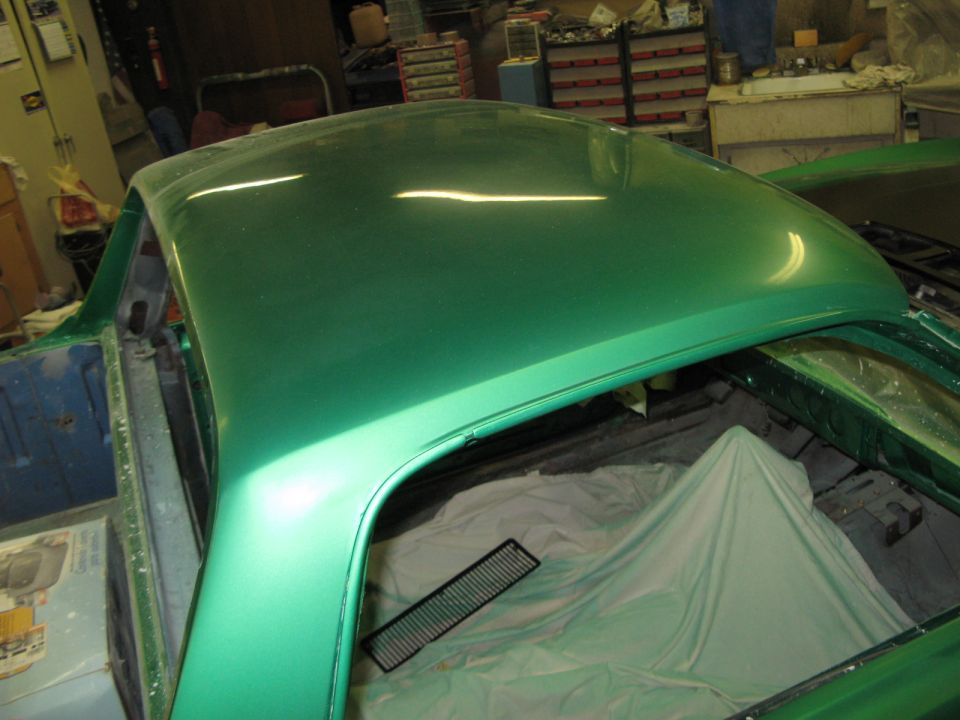 1971 Ford Ranchero roof and interior, covered with a light green tarp