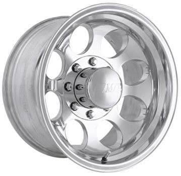 1990 Ford Bronco - Product-style studio shot of a polished aluminum eight-lug wheel with a deep dish lip and eight oval-teardrop cutouts around the face. The…