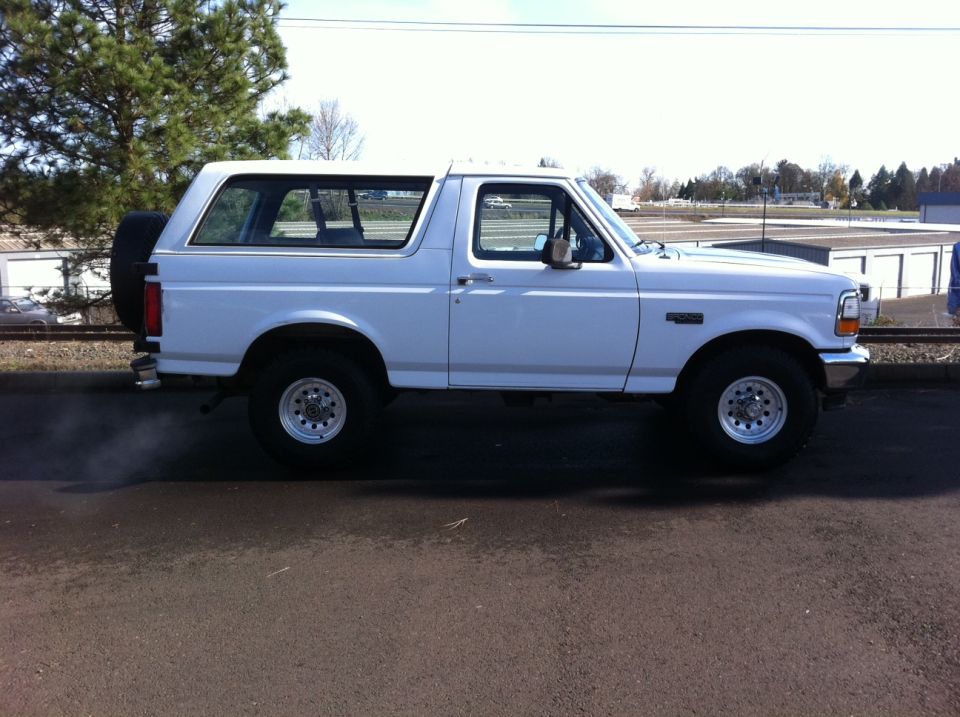 White full-size Ford Bronco SUV parked on pavement